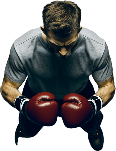 Un boxeur vu de dessus dans 2 positions : en garde et frappe.